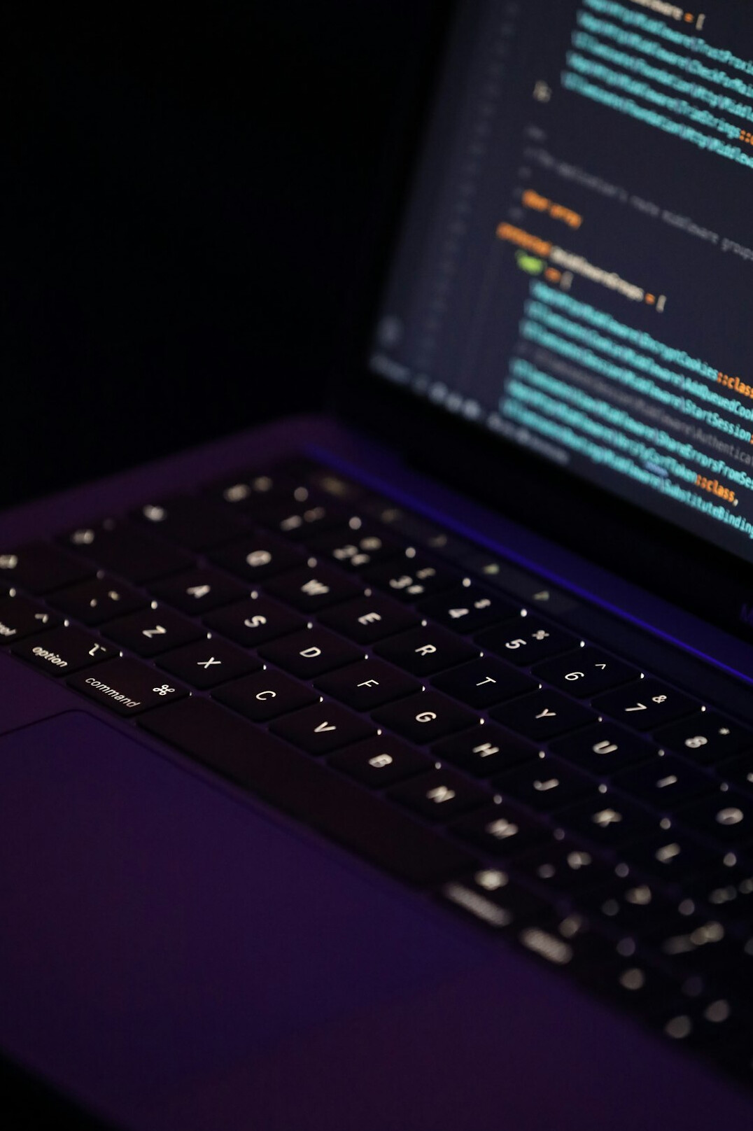 futuristic code on laptop screen